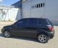Черный Киа Рио, объемом двигателя 1.34 л и пробегом 201 тыс. км за 5400 $, фото 4 на Automoto.ua