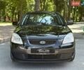 Чорний Кіа Ріо, об'ємом двигуна 1.4 л та пробігом 56 тис. км за 6700 $, фото 5 на Automoto.ua