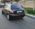 Черный Киа Рио, объемом двигателя 1.4 л и пробегом 297 тыс. км за 4500 $, фото 2 на Automoto.ua