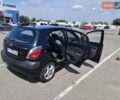 Черный Киа Рио, объемом двигателя 1.6 л и пробегом 164 тыс. км за 5400 $, фото 2 на Automoto.ua