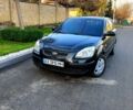 Чорний Кіа Ріо, об'ємом двигуна 1.4 л та пробігом 297 тис. км за 4500 $, фото 1 на Automoto.ua