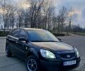 Черный Киа Рио, объемом двигателя 1.3 л и пробегом 201 тыс. км за 4200 $, фото 1 на Automoto.ua