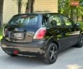 Чорний Кіа Ріо, об'ємом двигуна 1.4 л та пробігом 56 тис. км за 6700 $, фото 3 на Automoto.ua