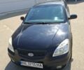 Черный Киа Рио, объемом двигателя 1.34 л и пробегом 201 тыс. км за 5400 $, фото 6 на Automoto.ua