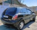 Черный Киа Рио, объемом двигателя 1.4 л и пробегом 297 тыс. км за 4300 $, фото 4 на Automoto.ua