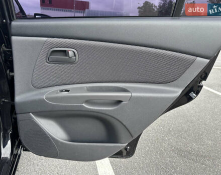 Черный Киа Рио, объемом двигателя 1.4 л и пробегом 158 тыс. км за 5000 $, фото 48 на Automoto.ua