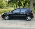 Чорний Кіа Ріо, об'ємом двигуна 1.4 л та пробігом 227 тис. км за 5200 $, фото 4 на Automoto.ua