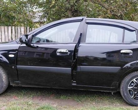 Черный Киа Рио, объемом двигателя 1.4 л и пробегом 293 тыс. км за 4500 $, фото 10 на Automoto.ua