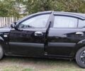 Черный Киа Рио, объемом двигателя 1.4 л и пробегом 293 тыс. км за 4500 $, фото 10 на Automoto.ua