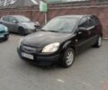 Черный Киа Рио, объемом двигателя 1.4 л и пробегом 203 тыс. км за 4499 $, фото 1 на Automoto.ua