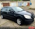 Черный Киа Рио, объемом двигателя 1.4 л и пробегом 110 тыс. км за 6399 $, фото 1 на Automoto.ua