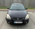 Черный Киа Рио, объемом двигателя 1.4 л и пробегом 230 тыс. км за 4400 $, фото 2 на Automoto.ua