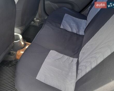 Черный Киа Рио, объемом двигателя 1.4 л и пробегом 220 тыс. км за 4500 $, фото 7 на Automoto.ua