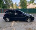 Чорний Кіа Ріо, об'ємом двигуна 1.4 л та пробігом 227 тис. км за 4800 $, фото 3 на Automoto.ua