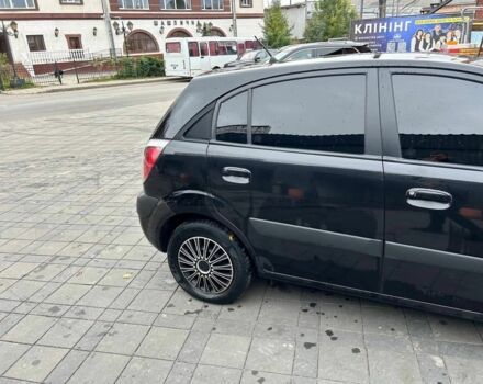 Чорний Кіа Ріо, об'ємом двигуна 1.4 л та пробігом 207 тис. км за 3952 $, фото 7 на Automoto.ua