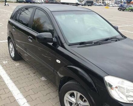 Чорний Кіа Ріо, об'ємом двигуна 1.4 л та пробігом 173 тис. км за 5250 $, фото 9 на Automoto.ua