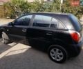 Черный Киа Рио, объемом двигателя 1.4 л и пробегом 220 тыс. км за 4500 $, фото 1 на Automoto.ua