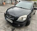 Чорний Кіа Ріо, об'ємом двигуна 1.4 л та пробігом 207 тис. км за 3952 $, фото 1 на Automoto.ua