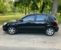 Чорний Кіа Ріо, об'ємом двигуна 1.4 л та пробігом 227 тис. км за 4800 $, фото 2 на Automoto.ua