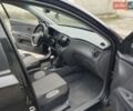 Черный Киа Рио, объемом двигателя 1.4 л и пробегом 110 тыс. км за 5999 $, фото 5 на Automoto.ua