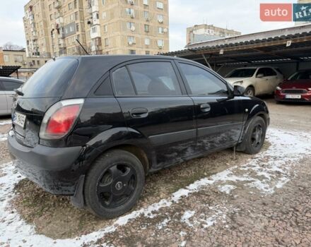 Черный Киа Рио, объемом двигателя 1.4 л и пробегом 245 тыс. км за 4300 $, фото 1 на Automoto.ua