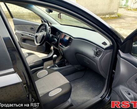 Черный Киа Рио, объемом двигателя 1.4 л и пробегом 110 тыс. км за 6399 $, фото 7 на Automoto.ua