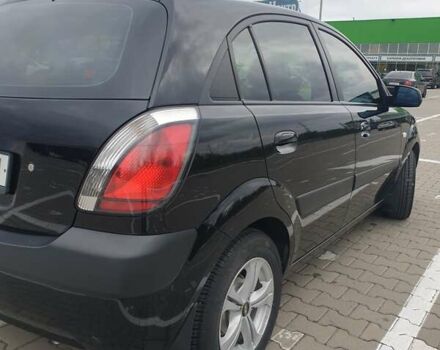 Чорний Кіа Ріо, об'ємом двигуна 1.4 л та пробігом 173 тис. км за 5250 $, фото 24 на Automoto.ua