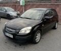 Черный Киа Рио, объемом двигателя 1.4 л и пробегом 203 тыс. км за 4499 $, фото 26 на Automoto.ua