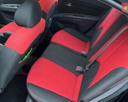 Черный Киа Рио, объемом двигателя 1.6 л и пробегом 230 тыс. км за 4900 $, фото 4 на Automoto.ua