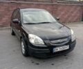 Черный Киа Рио, объемом двигателя 1.4 л и пробегом 203 тыс. км за 4499 $, фото 24 на Automoto.ua