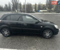 Черный Киа Рио, объемом двигателя 1.4 л и пробегом 208 тыс. км за 5400 $, фото 3 на Automoto.ua