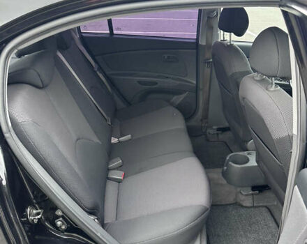 Черный Киа Рио, объемом двигателя 1.4 л и пробегом 158 тыс. км за 5000 $, фото 50 на Automoto.ua