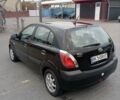 Черный Киа Рио, объемом двигателя 1.4 л и пробегом 203 тыс. км за 4499 $, фото 38 на Automoto.ua