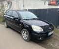 Чорний Кіа Ріо, об'ємом двигуна 1.4 л та пробігом 152 тис. км за 4500 $, фото 1 на Automoto.ua