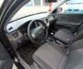 Черный Киа Рио, объемом двигателя 1.4 л и пробегом 203 тыс. км за 4499 $, фото 54 на Automoto.ua