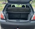 Черный Киа Рио, объемом двигателя 1.4 л и пробегом 144 тыс. км за 4600 $, фото 4 на Automoto.ua