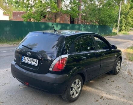 Чорний Кіа Ріо, об'ємом двигуна 1.4 л та пробігом 227 тис. км за 4800 $, фото 5 на Automoto.ua