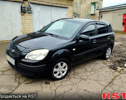 Черный Киа Рио, объемом двигателя 1.4 л и пробегом 110 тыс. км за 6399 $, фото 1 на Automoto.ua