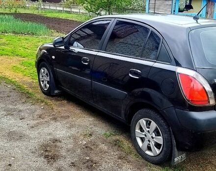 Чорний Кіа Ріо, об'ємом двигуна 1.4 л та пробігом 160 тис. км за 4500 $, фото 3 на Automoto.ua
