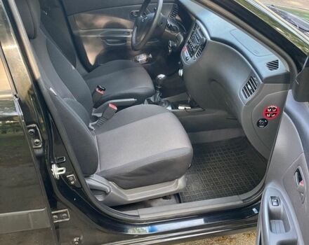 Чорний Кіа Ріо, об'ємом двигуна 1.4 л та пробігом 227 тис. км за 4800 $, фото 12 на Automoto.ua