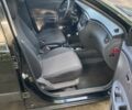 Чорний Кіа Ріо, об'ємом двигуна 1.4 л та пробігом 227 тис. км за 4800 $, фото 12 на Automoto.ua