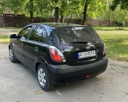 Чорний Кіа Ріо, об'ємом двигуна 1.4 л та пробігом 227 тис. км за 5200 $, фото 3 на Automoto.ua