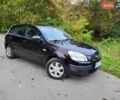 Черный Киа Рио, объемом двигателя 1.4 л и пробегом 184 тыс. км за 4999 $, фото 1 на Automoto.ua