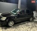 Чорний Кіа Ріо, об'ємом двигуна 1.4 л та пробігом 152 тис. км за 4500 $, фото 4 на Automoto.ua