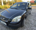 Черный Киа Рио, объемом двигателя 1.4 л и пробегом 156 тыс. км за 5300 $, фото 1 на Automoto.ua