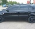 Черный Киа Рио, объемом двигателя 1.4 л и пробегом 144 тыс. км за 4600 $, фото 1 на Automoto.ua