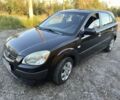 Черный Киа Рио, объемом двигателя 1.4 л и пробегом 174 тыс. км за 5514 $, фото 4 на Automoto.ua