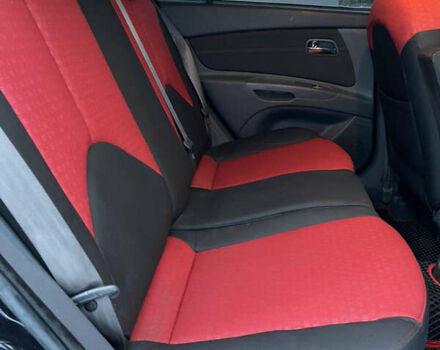 Черный Киа Рио, объемом двигателя 1.6 л и пробегом 233 тыс. км за 4199 $, фото 22 на Automoto.ua