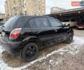 Чорний Кіа Ріо, об'ємом двигуна 1.4 л та пробігом 245 тис. км за 4300 $, фото 1 на Automoto.ua