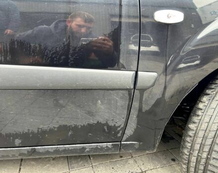 Чорний Кіа Ріо, об'ємом двигуна 1.4 л та пробігом 207 тис. км за 3952 $, фото 9 на Automoto.ua